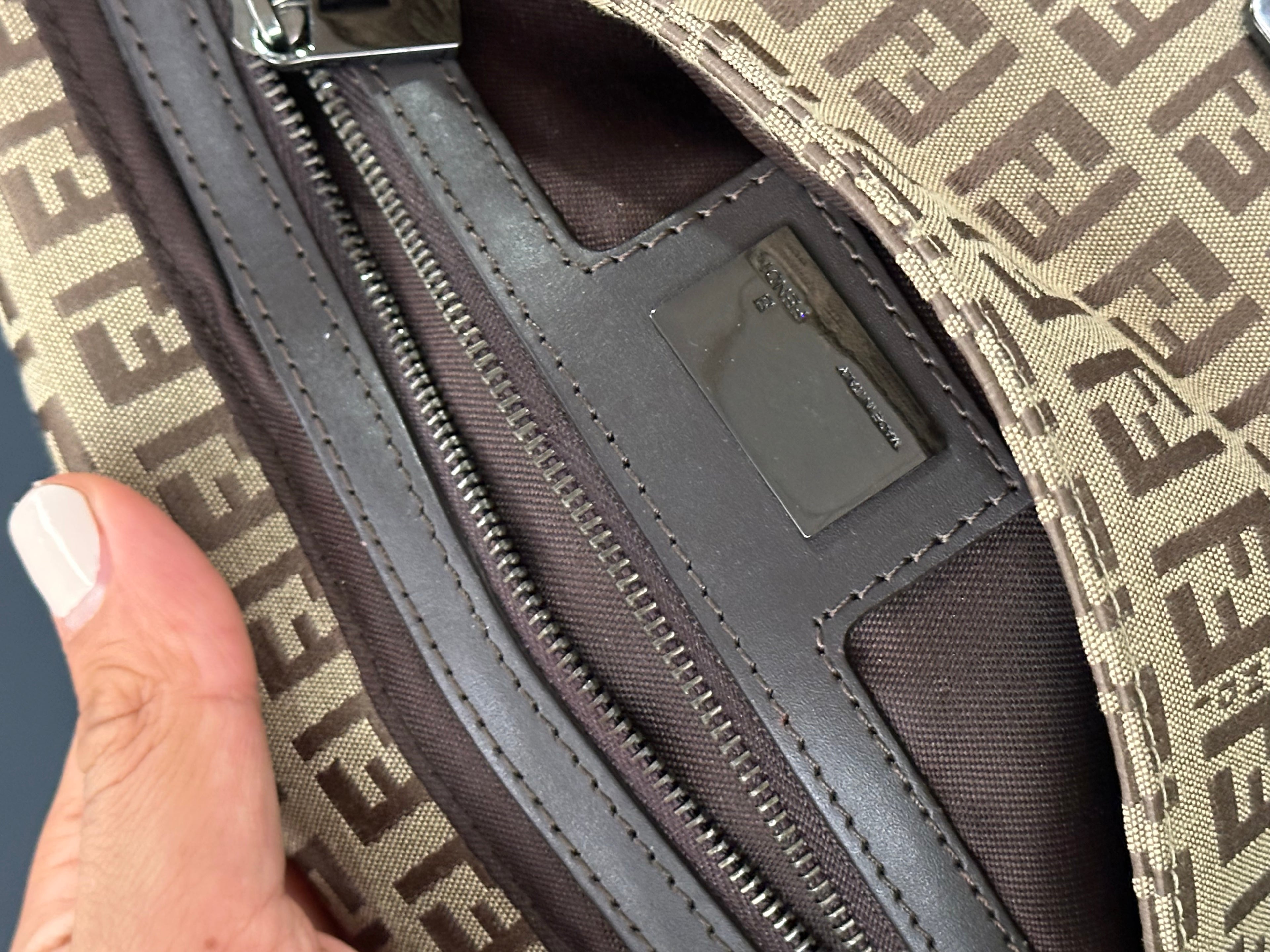 Fendi Baguette (the original “It-bag” silhouette)
