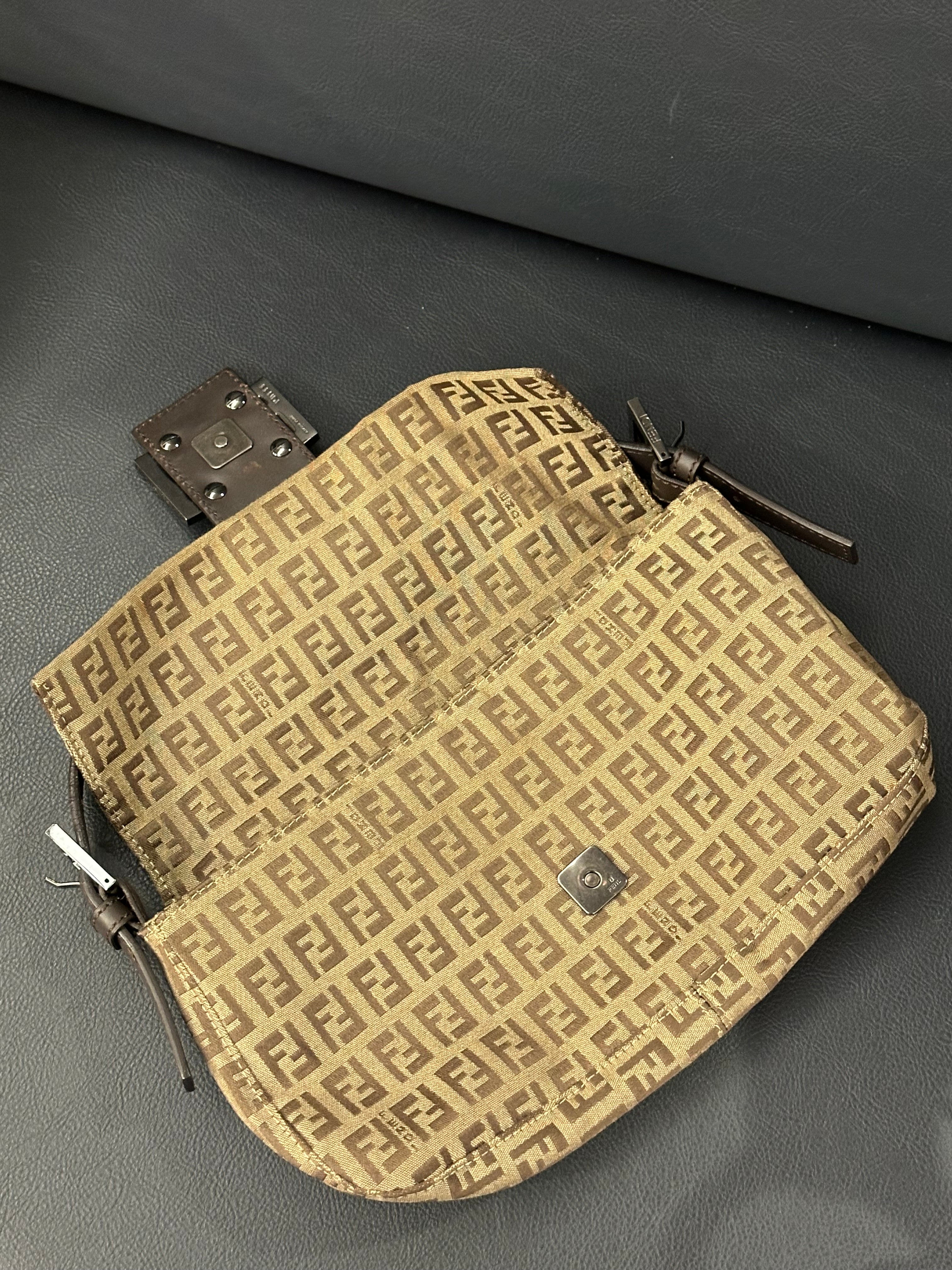 Fendi Baguette (the original “It-bag” silhouette)