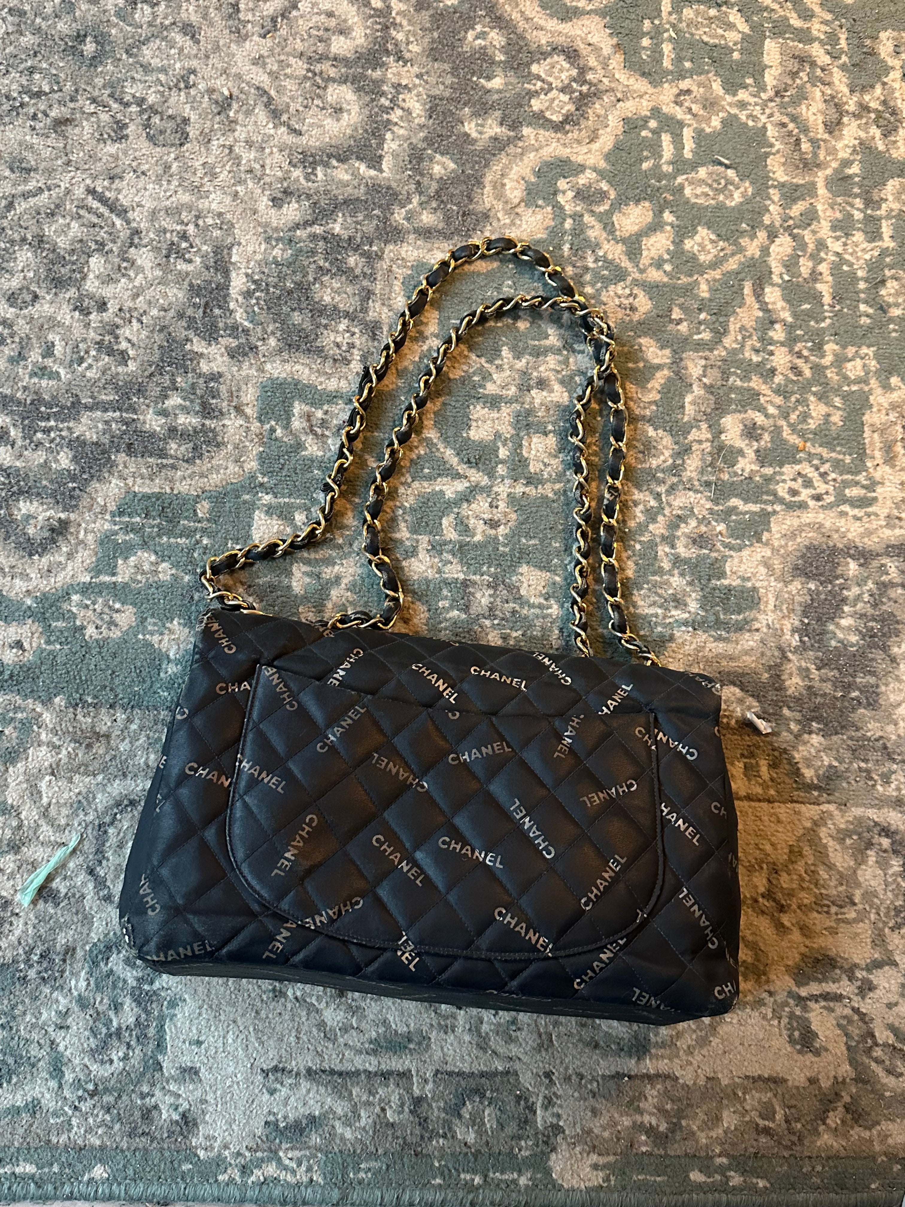 Chanel Black Quilted Canvas Logo Print Maxi XL Flap Bag