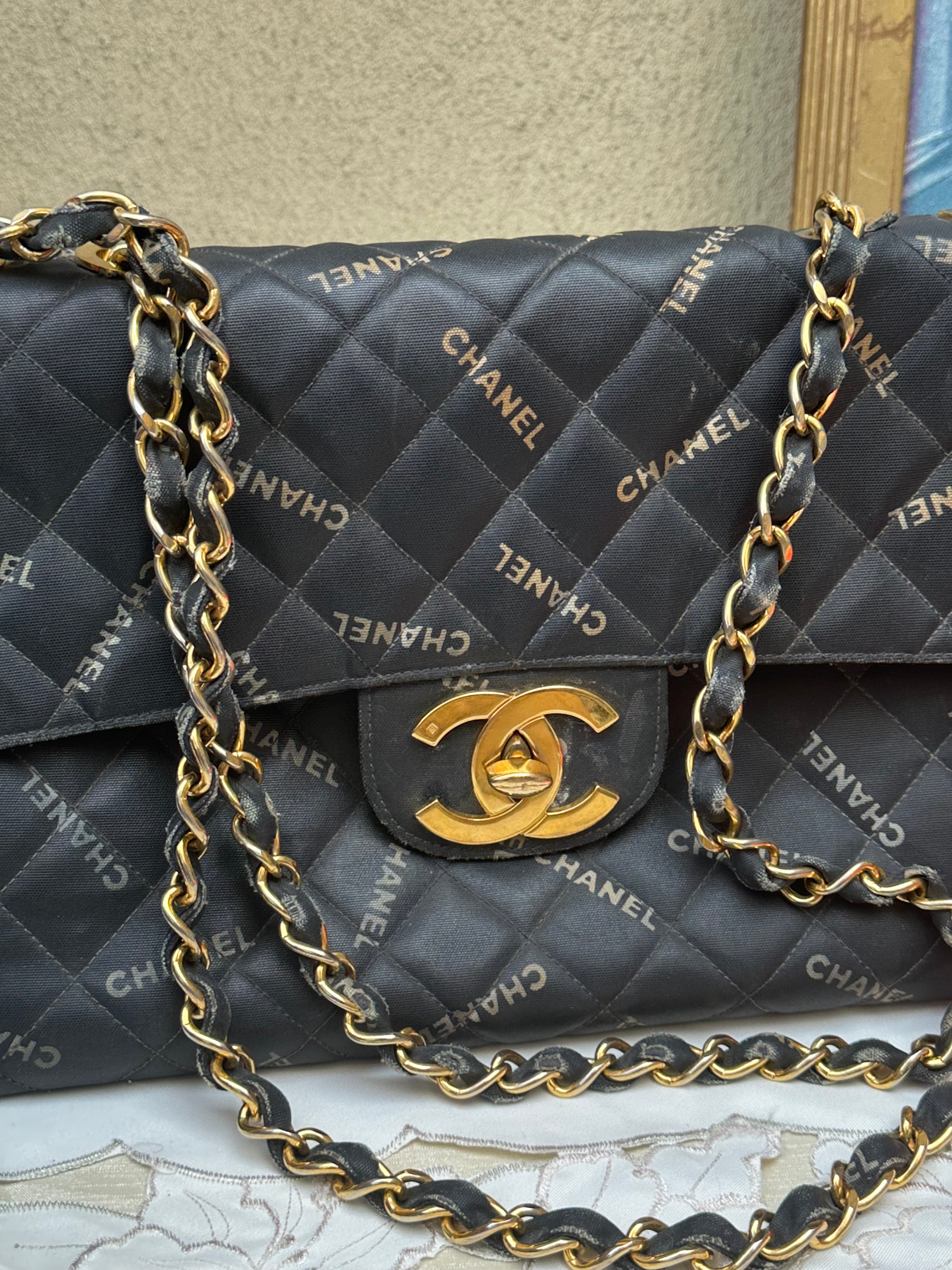 Chanel Black Quilted Canvas Logo Print Maxi XL Flap Bag
