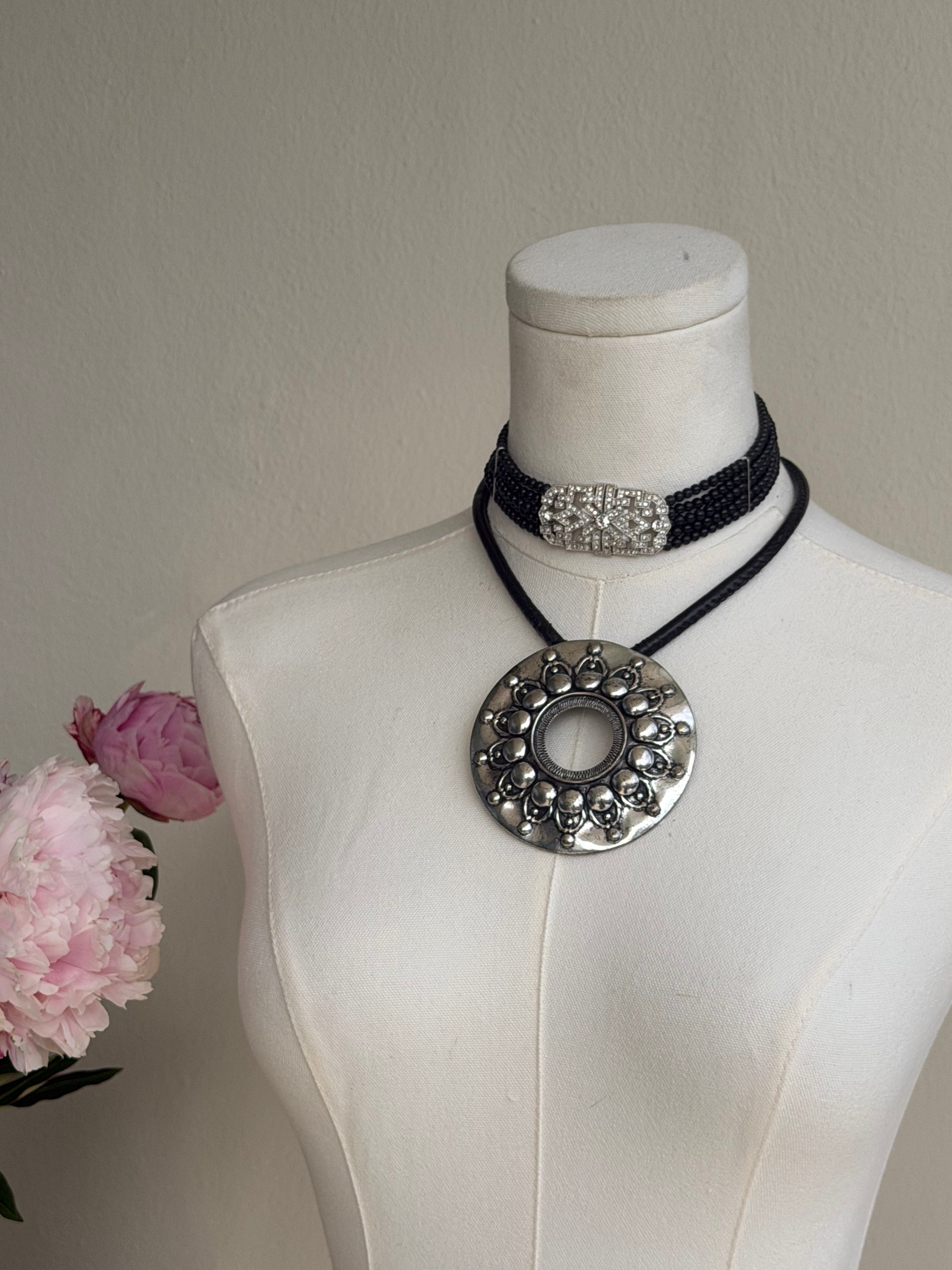 Silver Medallion Pendant Necklace on Black Cord