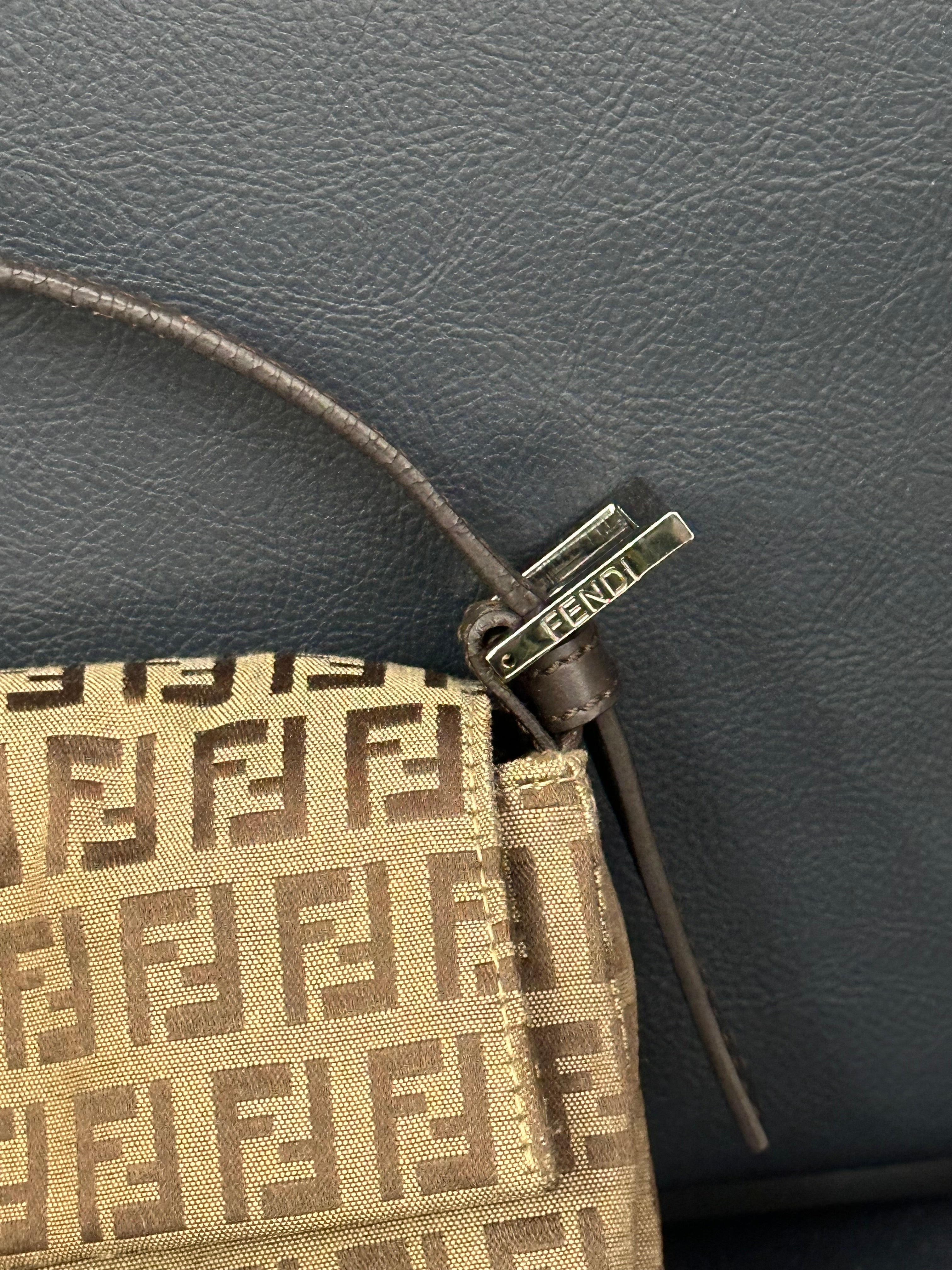 Fendi Baguette (the original “It-bag” silhouette)