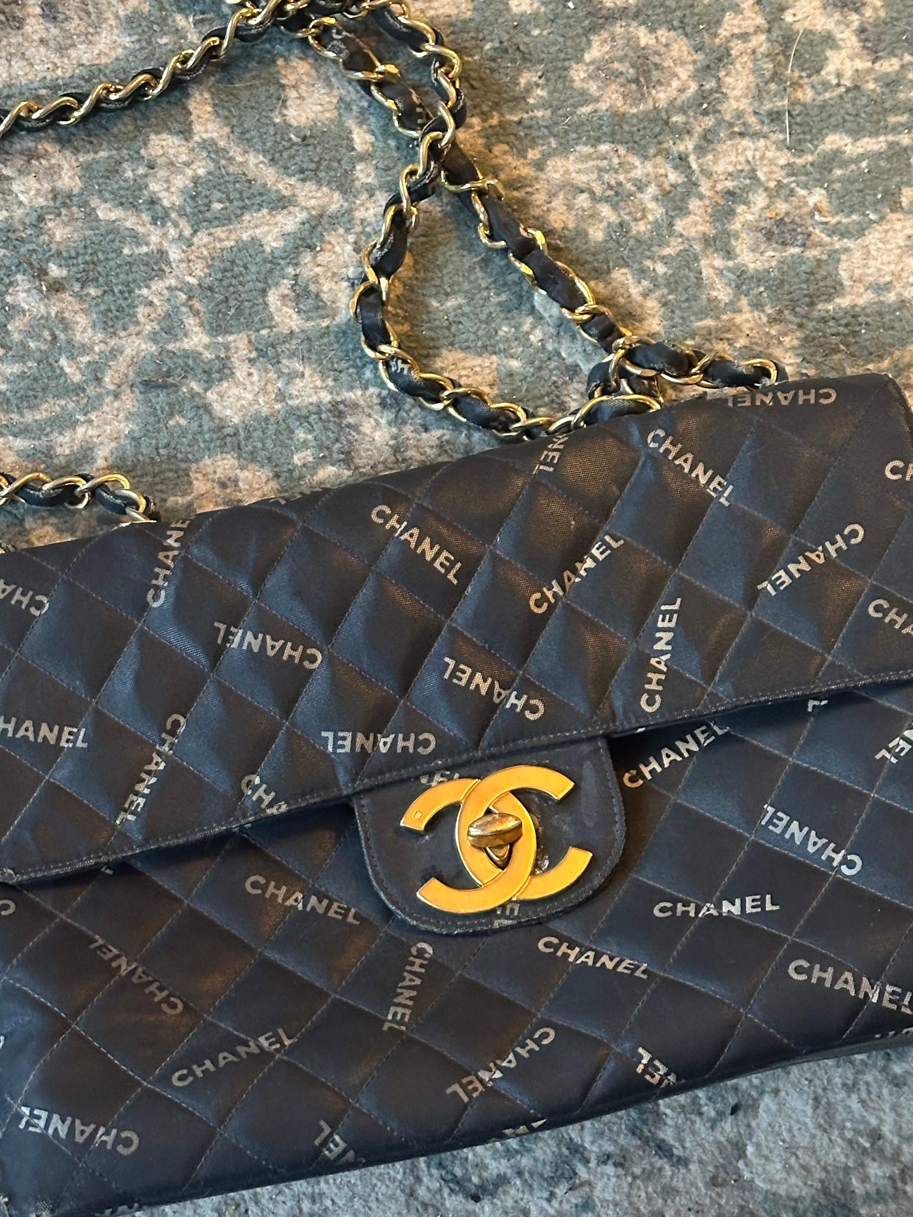 Chanel Black Quilted Canvas Logo Print Maxi XL Flap Bag