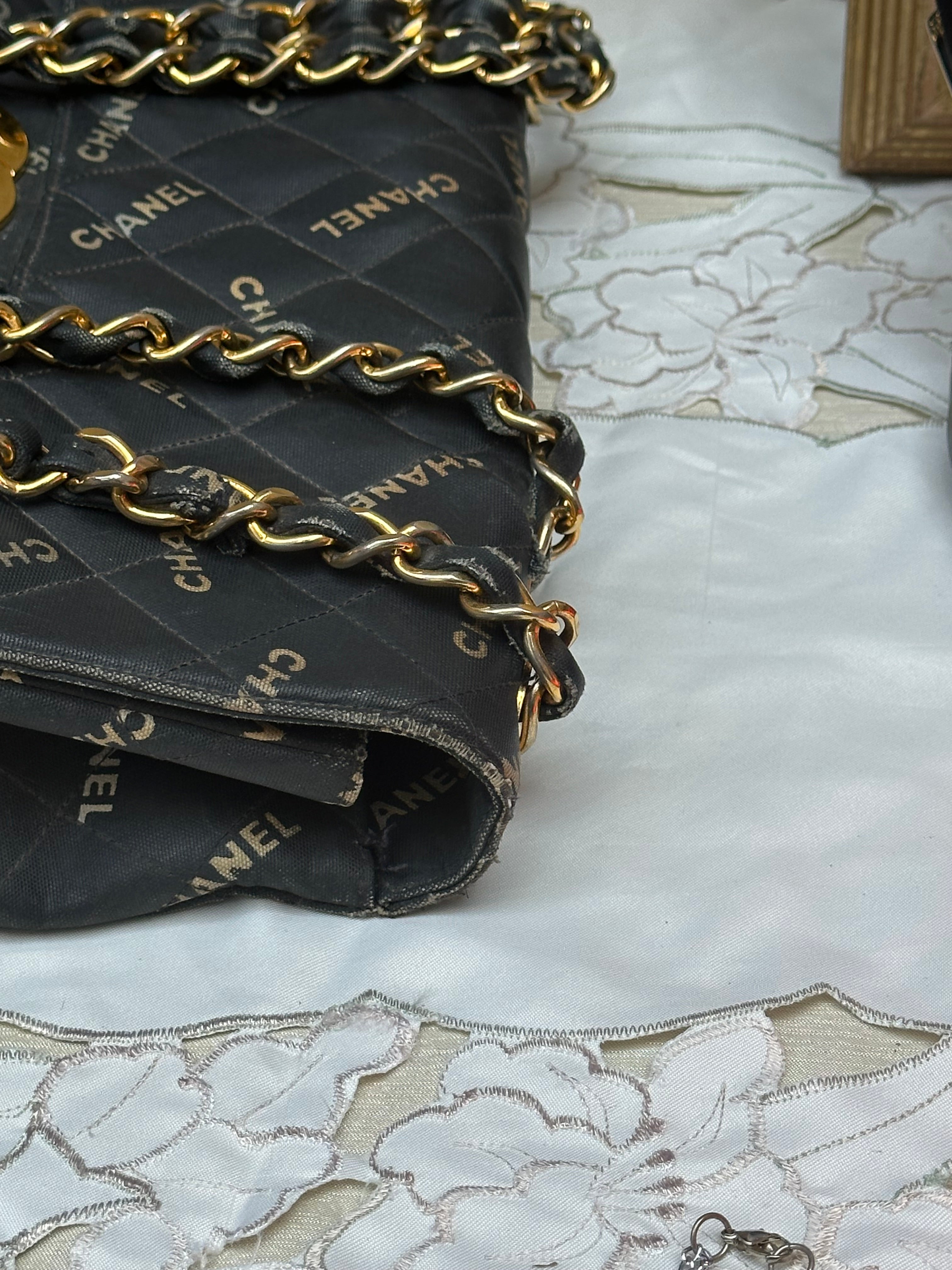 Chanel Black Quilted Canvas Logo Print Maxi XL Flap Bag