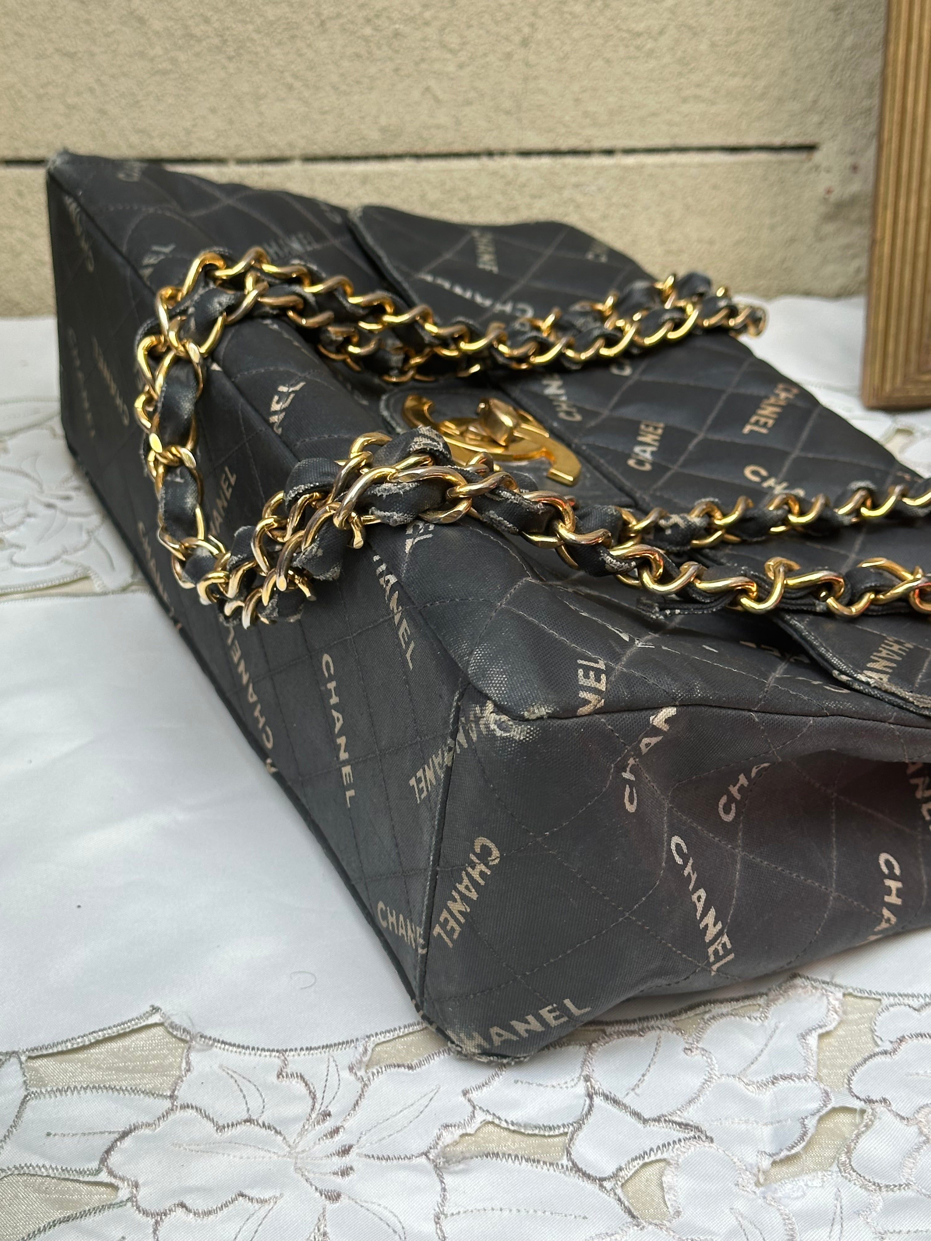 Chanel Black Quilted Canvas Logo Print Maxi XL Flap Bag