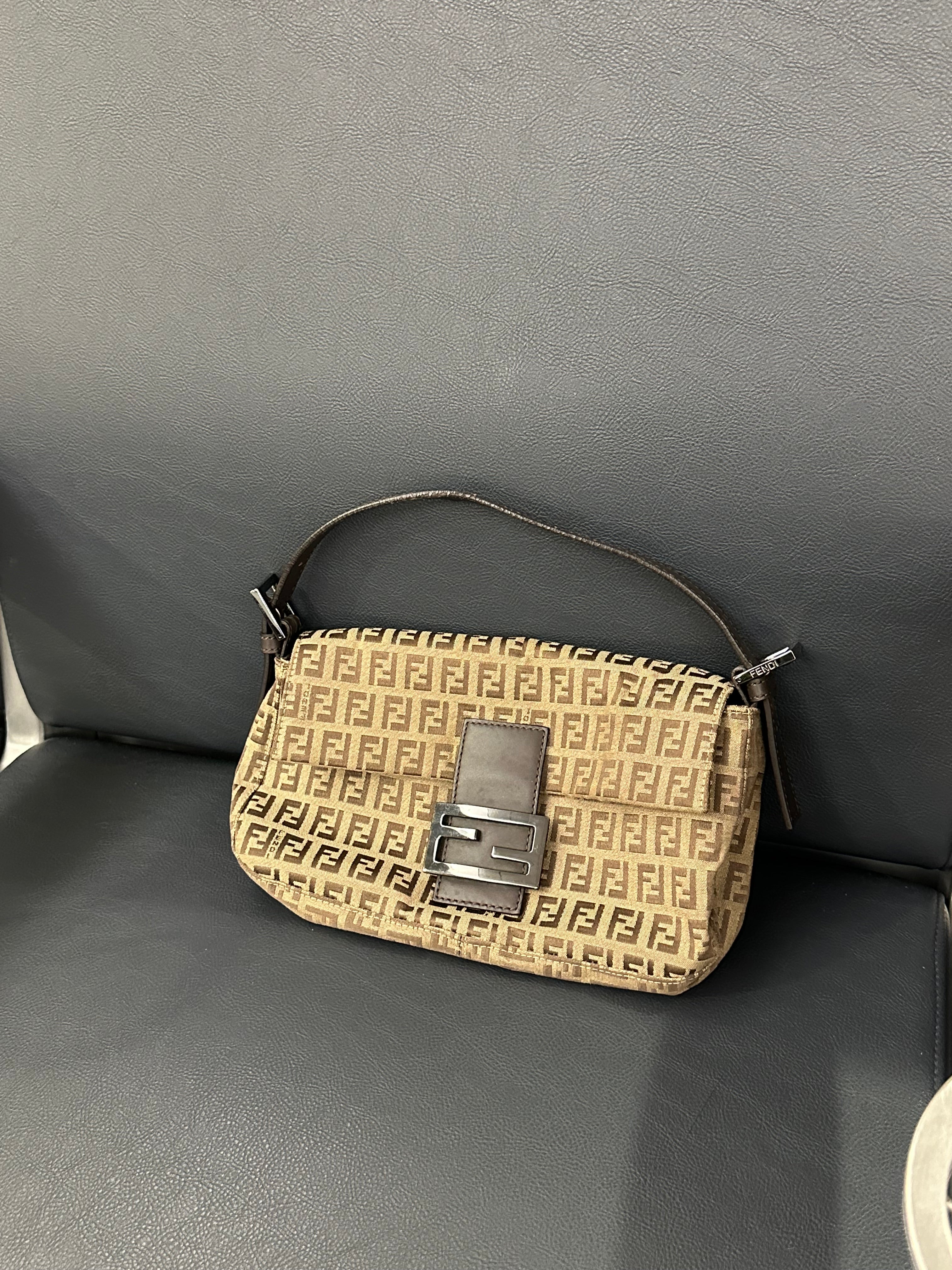 Fendi Baguette (the original “It-bag” silhouette)