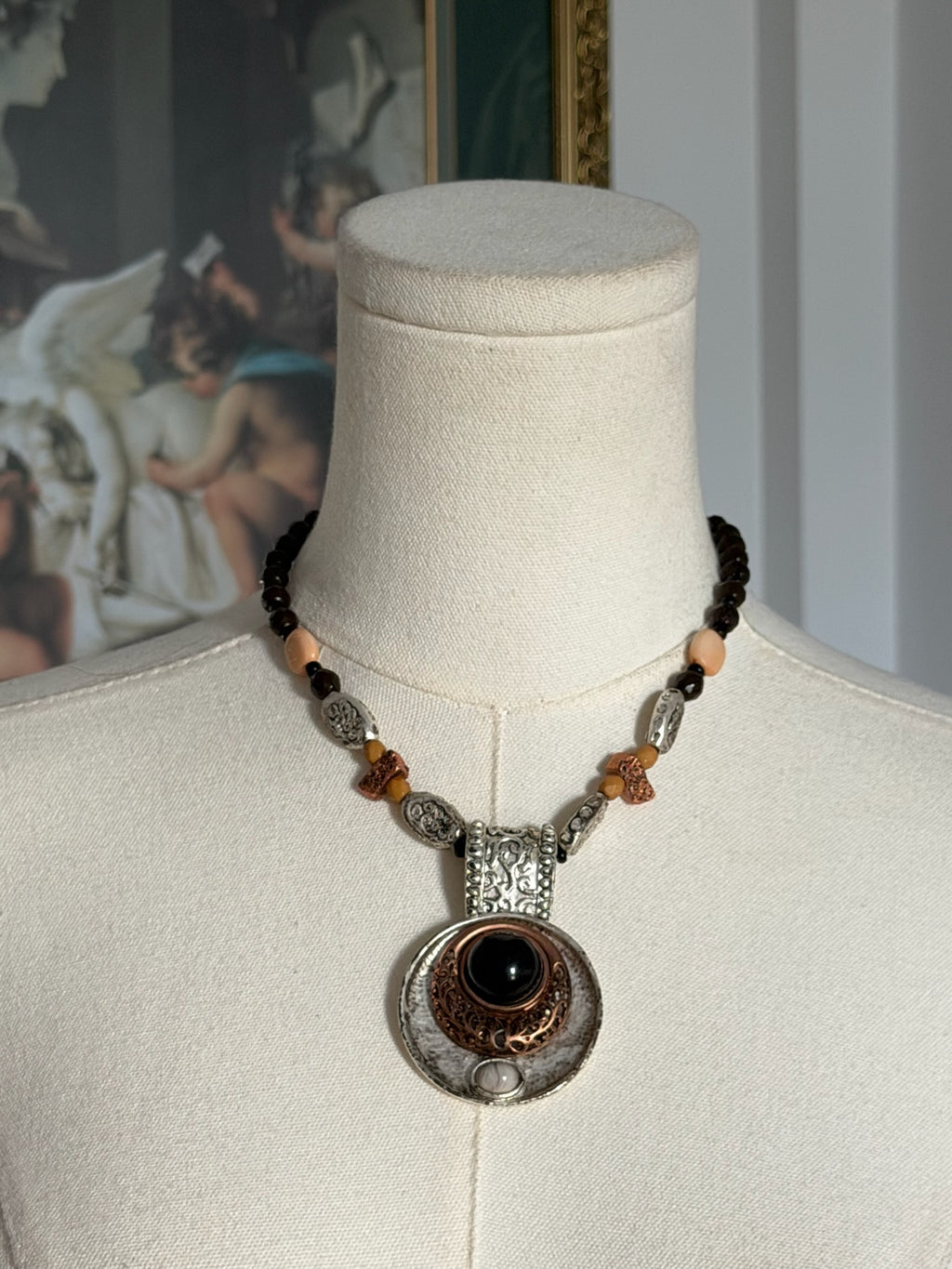 Mixed metal pendant necklace