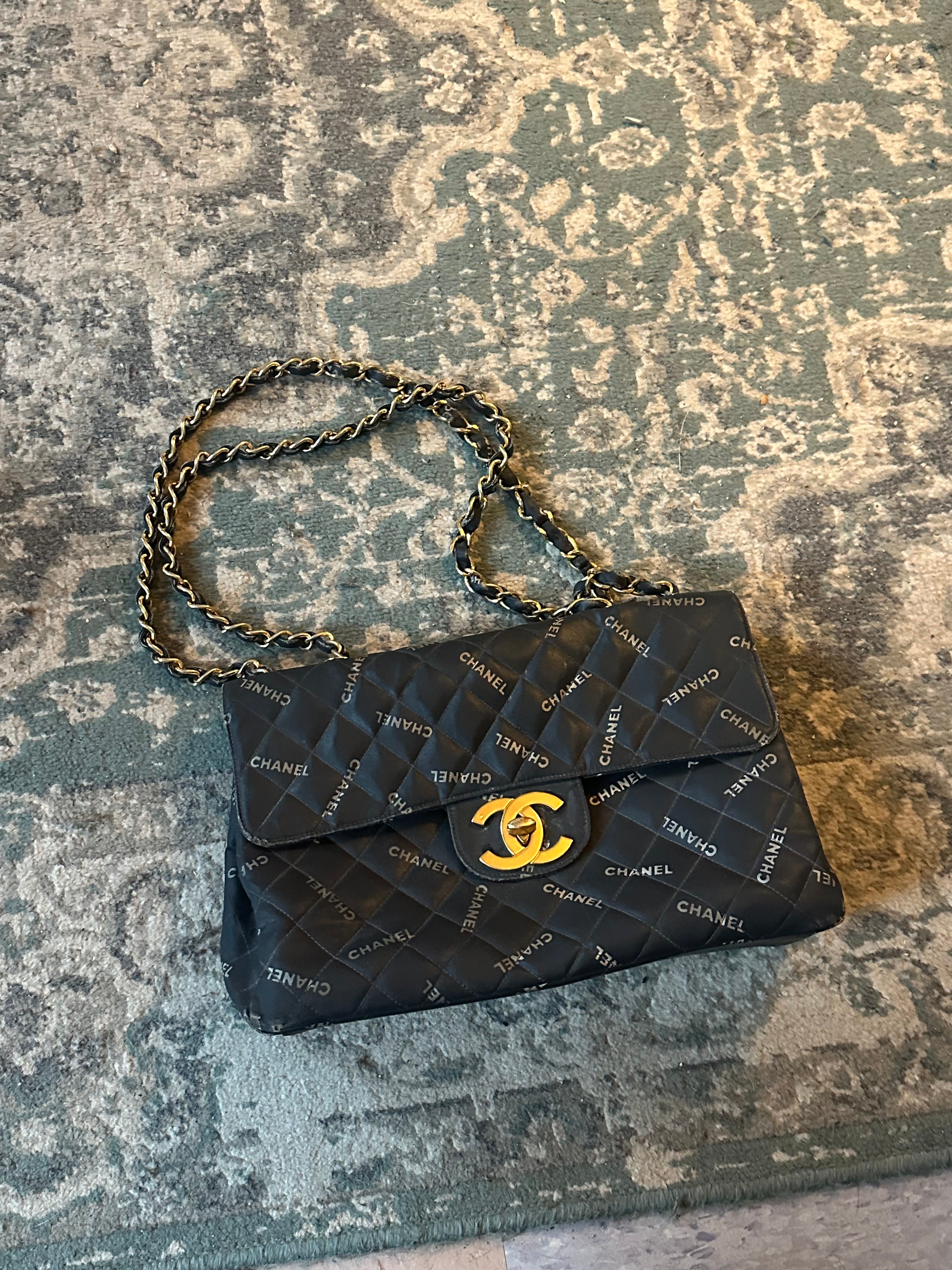 Chanel Black Quilted Canvas Logo Print Maxi XL Flap Bag