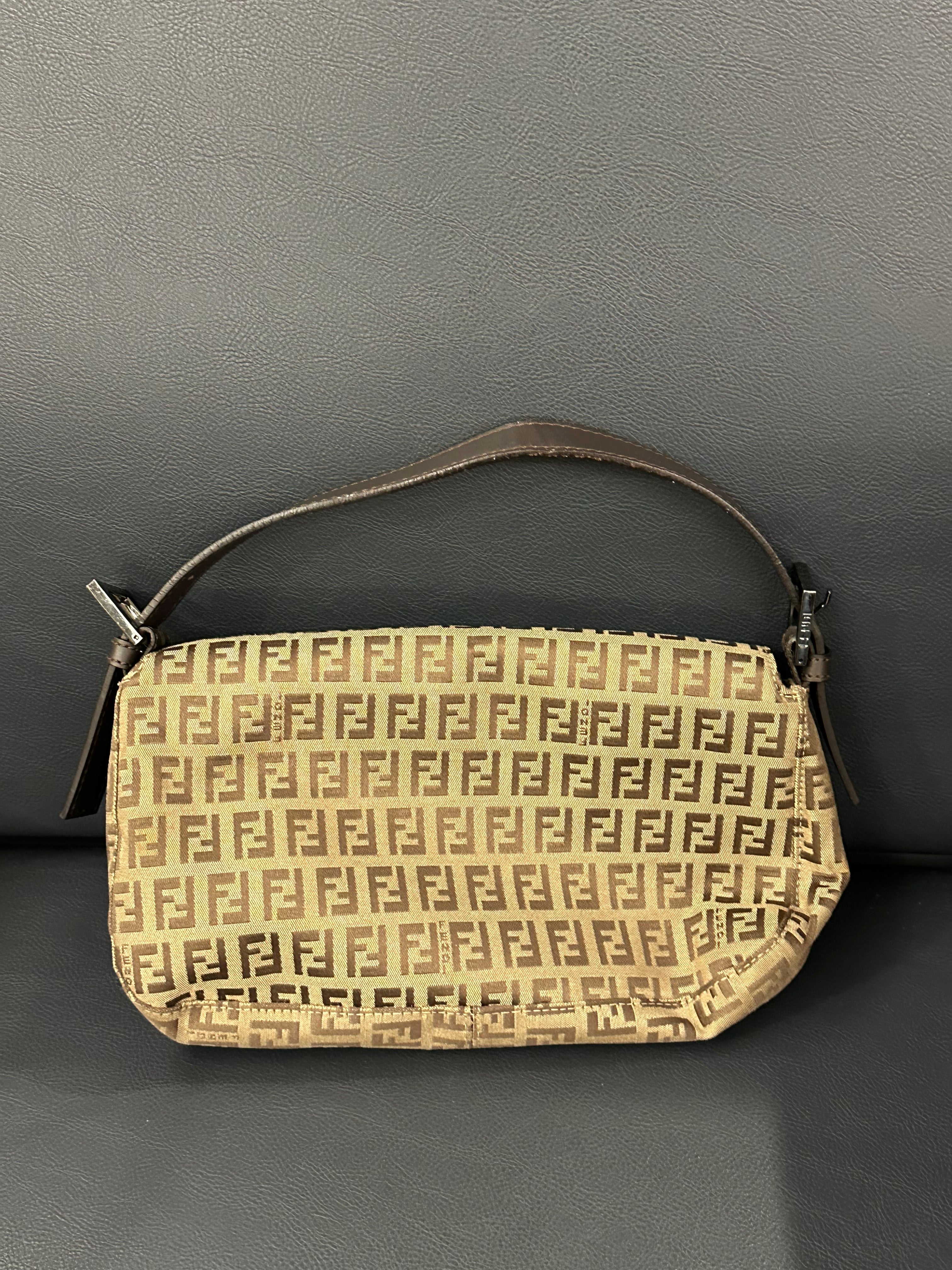 Fendi Baguette (the original “It-bag” silhouette)