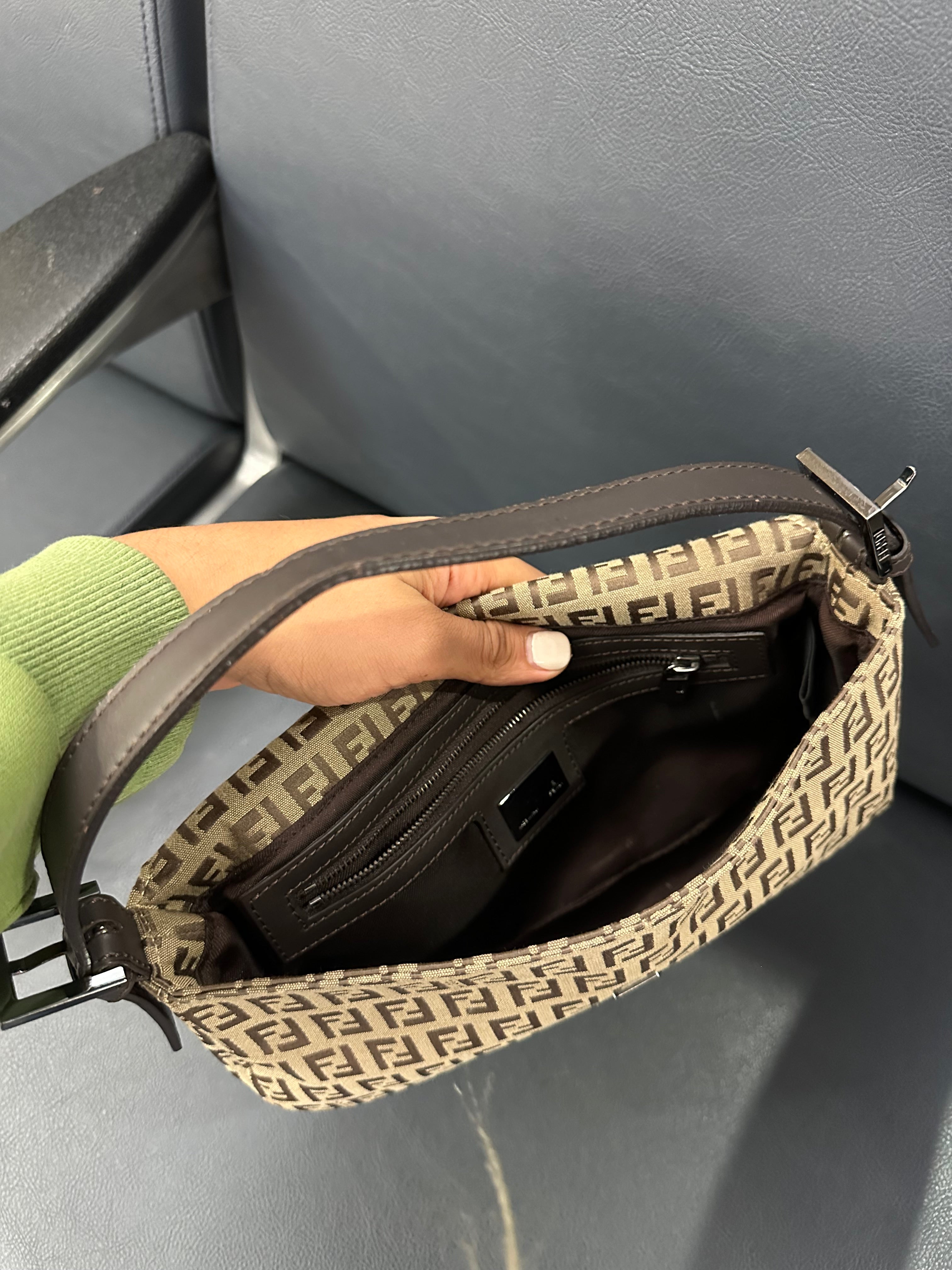 Fendi Baguette (the original “It-bag” silhouette)