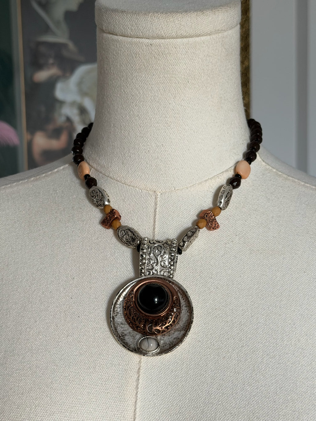 Mixed metal pendant necklace