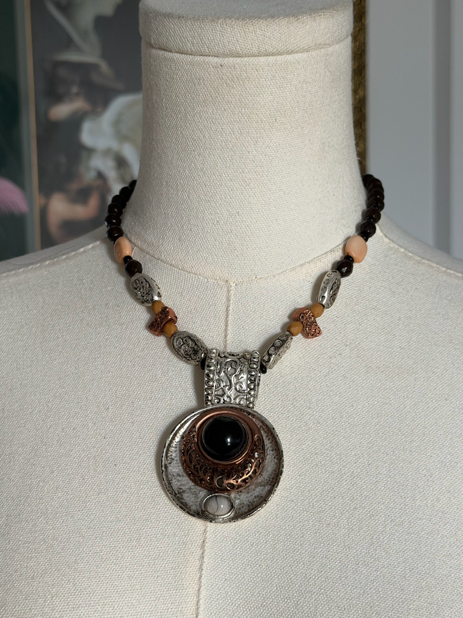 Mixed metal pendant necklace