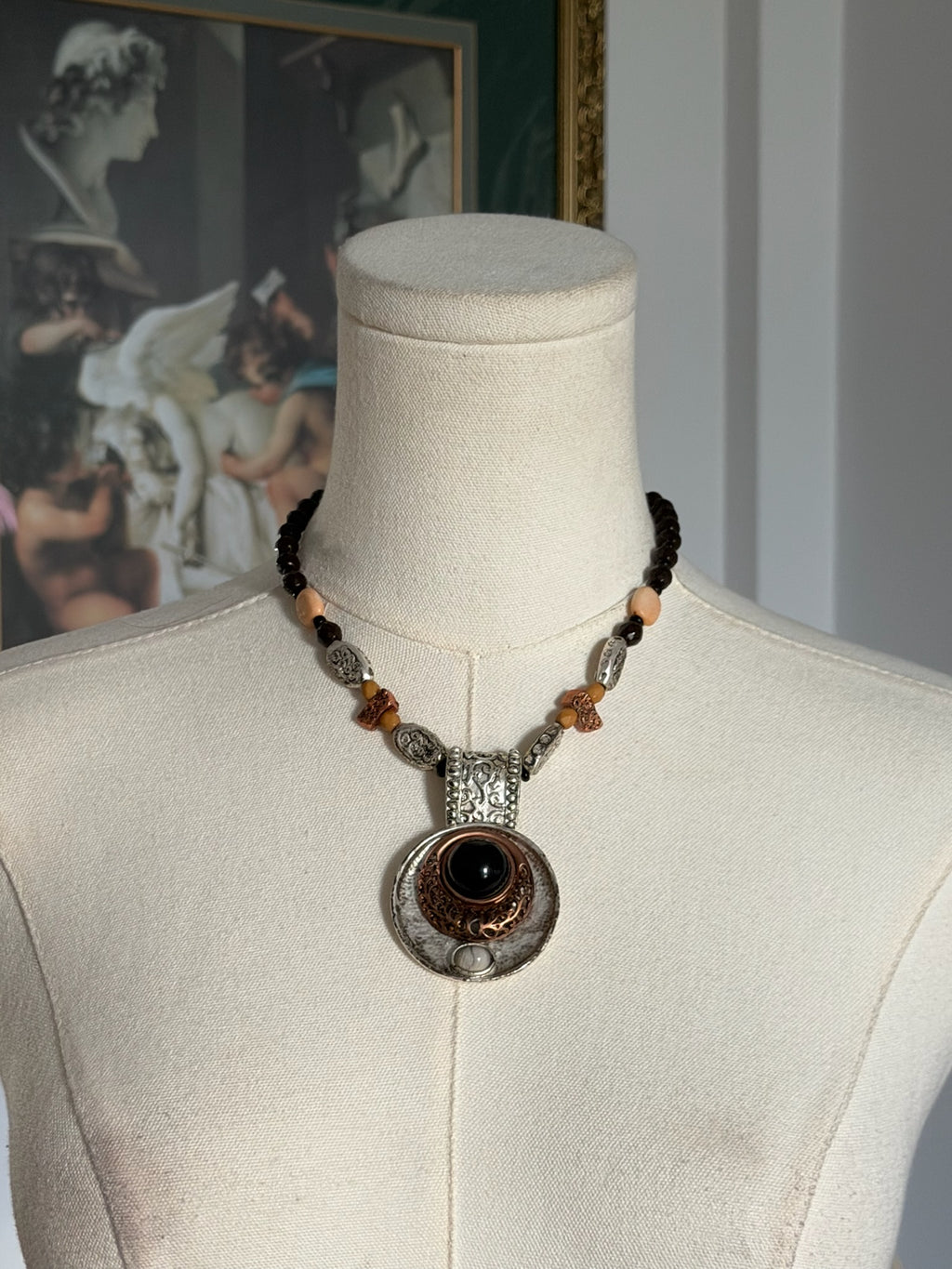 Mixed metal pendant necklace