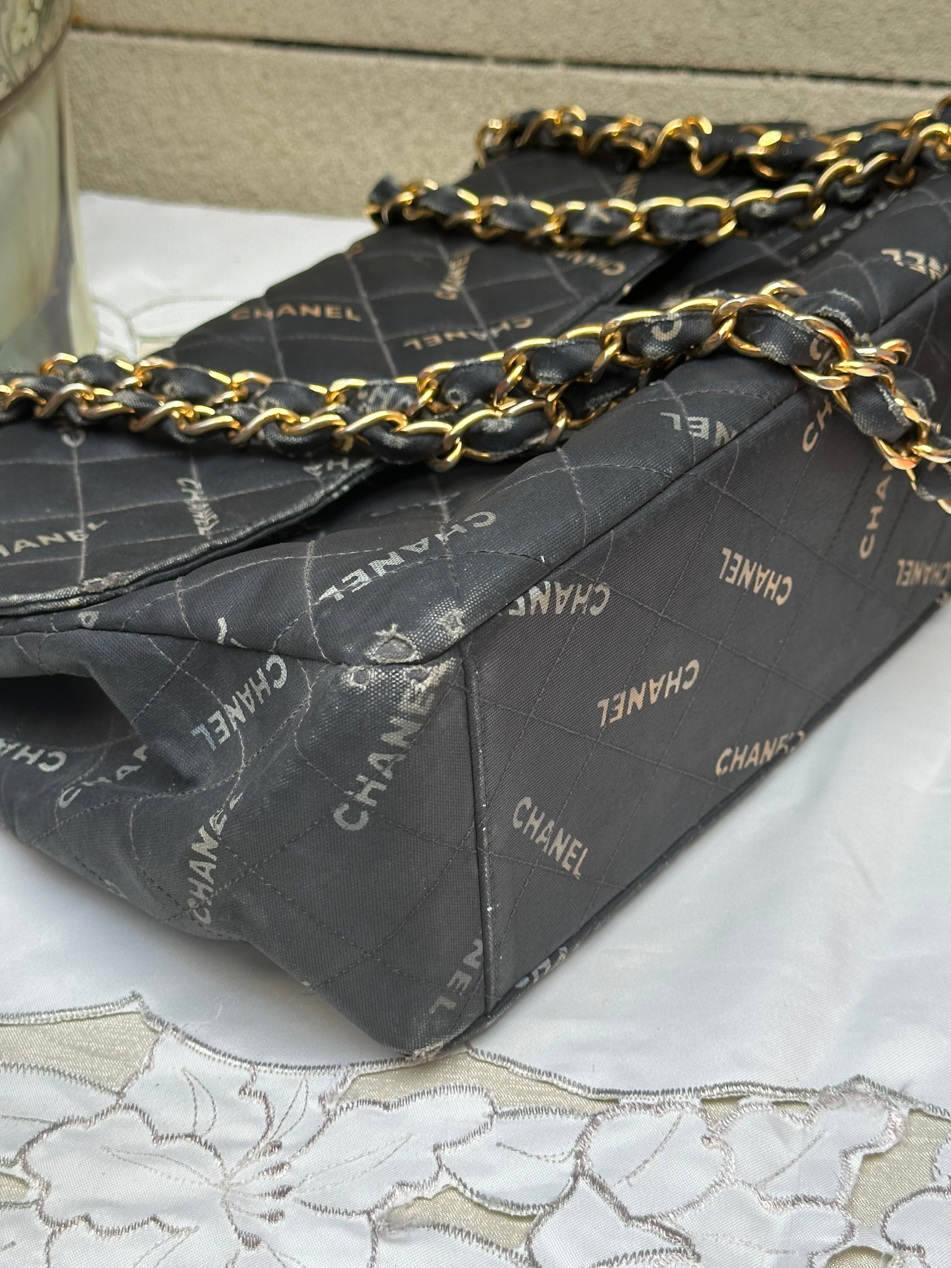 Chanel Black Quilted Canvas Logo Print Maxi XL Flap Bag